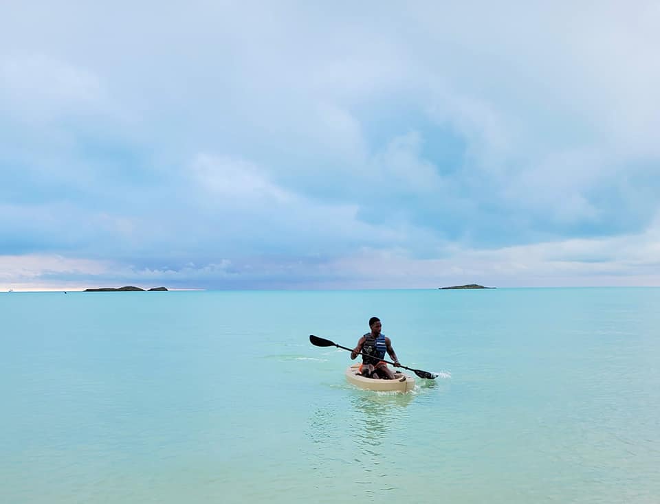 kayaking at One of my favorite places to visit in the world is Turks & Caicos. The vibe is relaxed, the people are nice, the water is the bluest and the aura is calming.